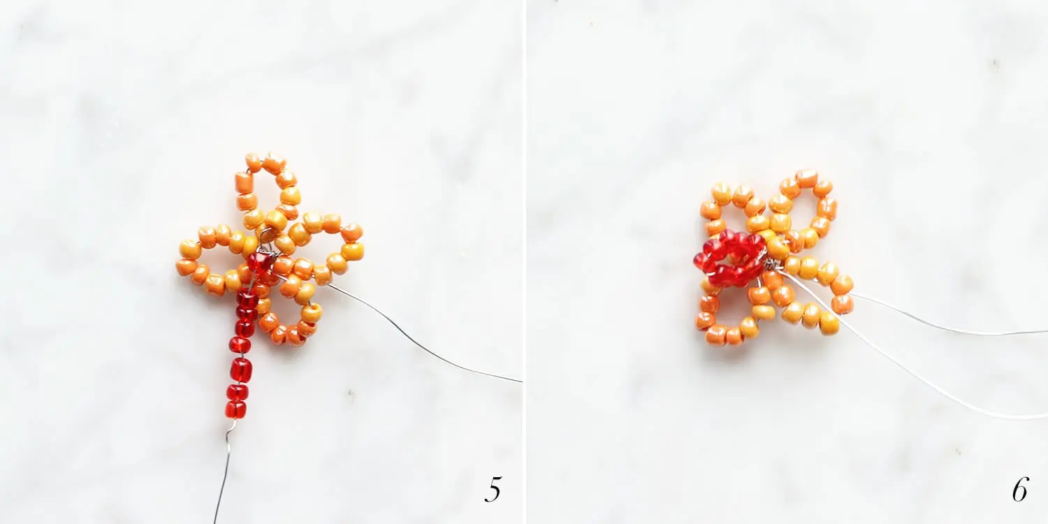 Orange and red beads being strung to create a rounded beaded flower